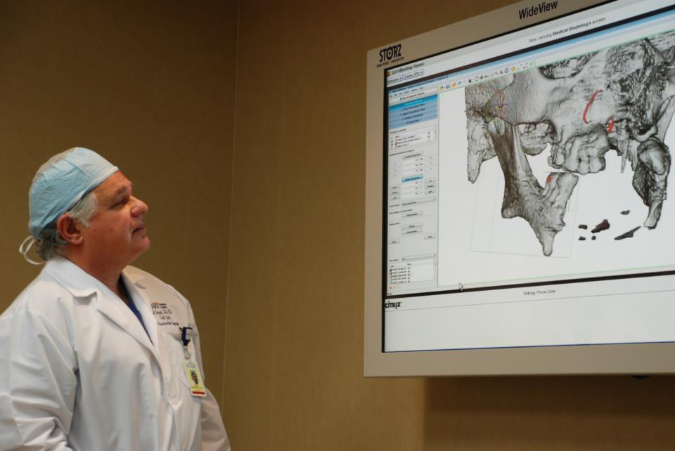 Dr. Berger studying 3D model of Makwera's jaw
