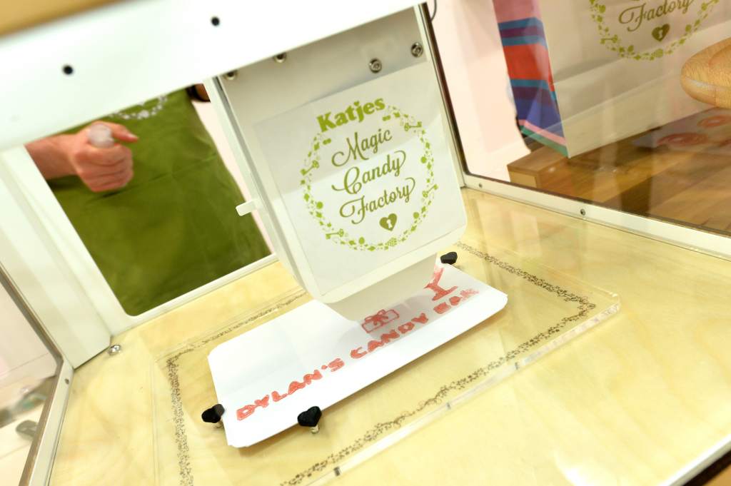 "NEW YORK, NY - MAY 19: A 3D candy printer is seen during Dylan's Candy Bar exclusively launches first 3D printed candy in the U.S. with Katjes Magic Candy Factory on May 19, 2016 in New York, New York. (Photo by Andrew Toth/Getty Images for Dylan's Candy Bar)"