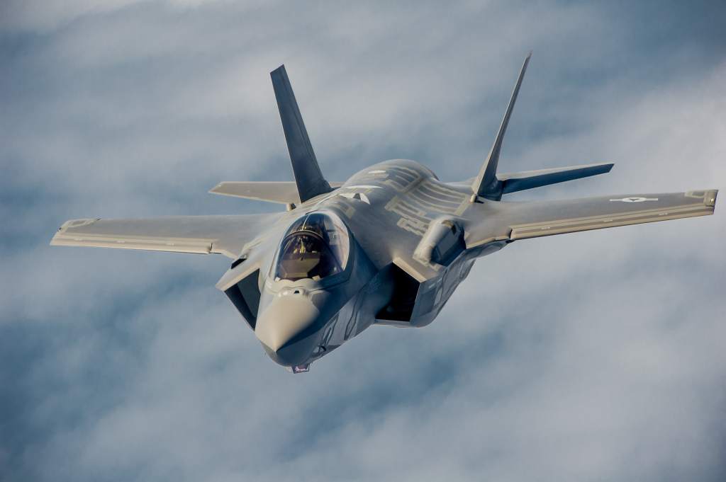 An F-35 Lightning II instructor pilots conduct aerial refueling.