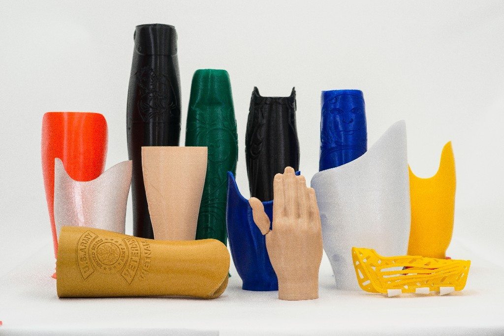 Create O&P 3D printed prostheses and leg covers. Photo via Create O&P