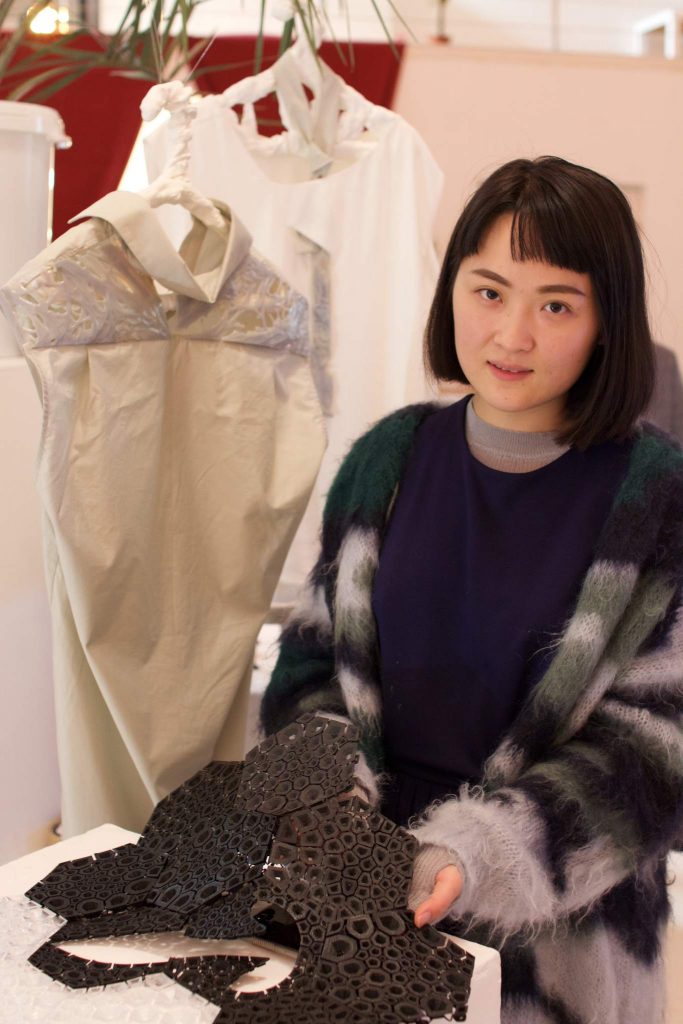 Fashion designer Minjing Lin and her 3D-printed clothes. Photo via: iMakr at Digical