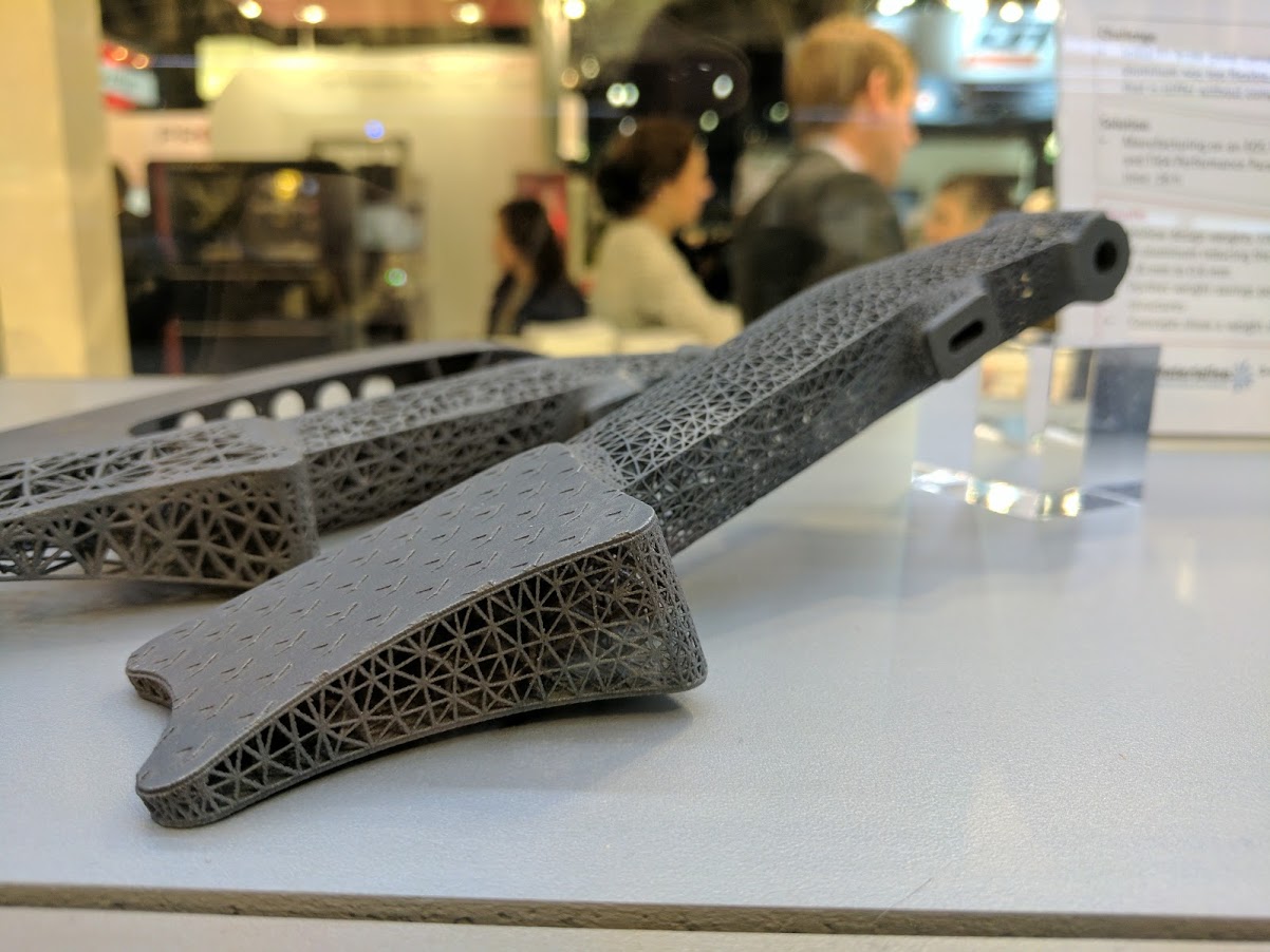 EOS F1 brake pedal with hollow design made from EOS Titanium Ti64 at Formnext 2016. Photo by Michael Petch.