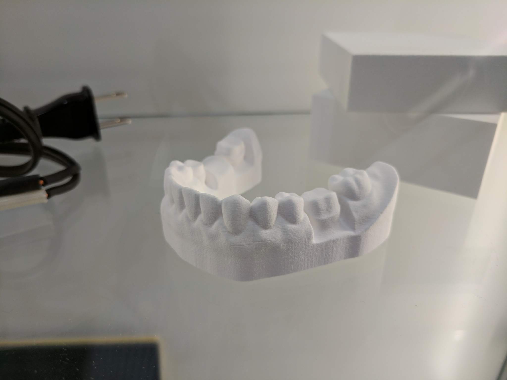 Ceramic dental impression from the Roland AG ceramics printer.