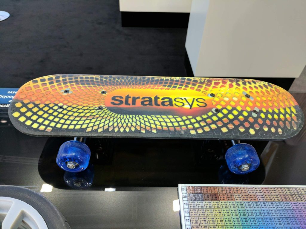 A sample full-color skateboard 3D printed by Stratasys. Photo via: Michael Petch