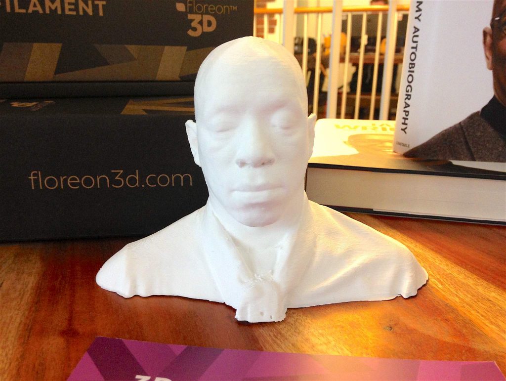 A miniature 3D printed bust of ex-footballer Ian Wright, used in a competition for MyMiniFactory designers to create a pair of glasses for the star. Photo by: Beau Jackson for 3DPI