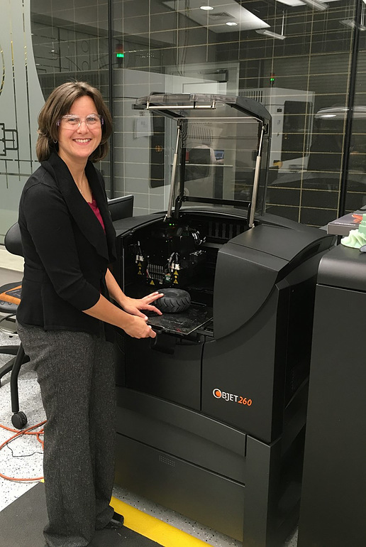 Am engineer with 3D printer at Caterpillar Inc's factory