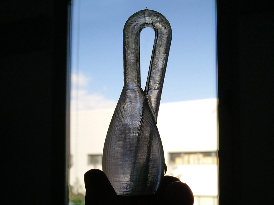 A glass ornament 3D printed at 100 micron layer thickness. Photo via: Eran Gal-Or