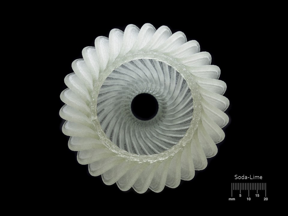 A Micron3DP 3D printed soda-lime glass ornament. Photo via: Eran Gal-Or