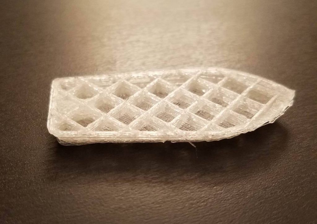 Waffle-like infill of an incomplete boat. Photo via: madprinter.org