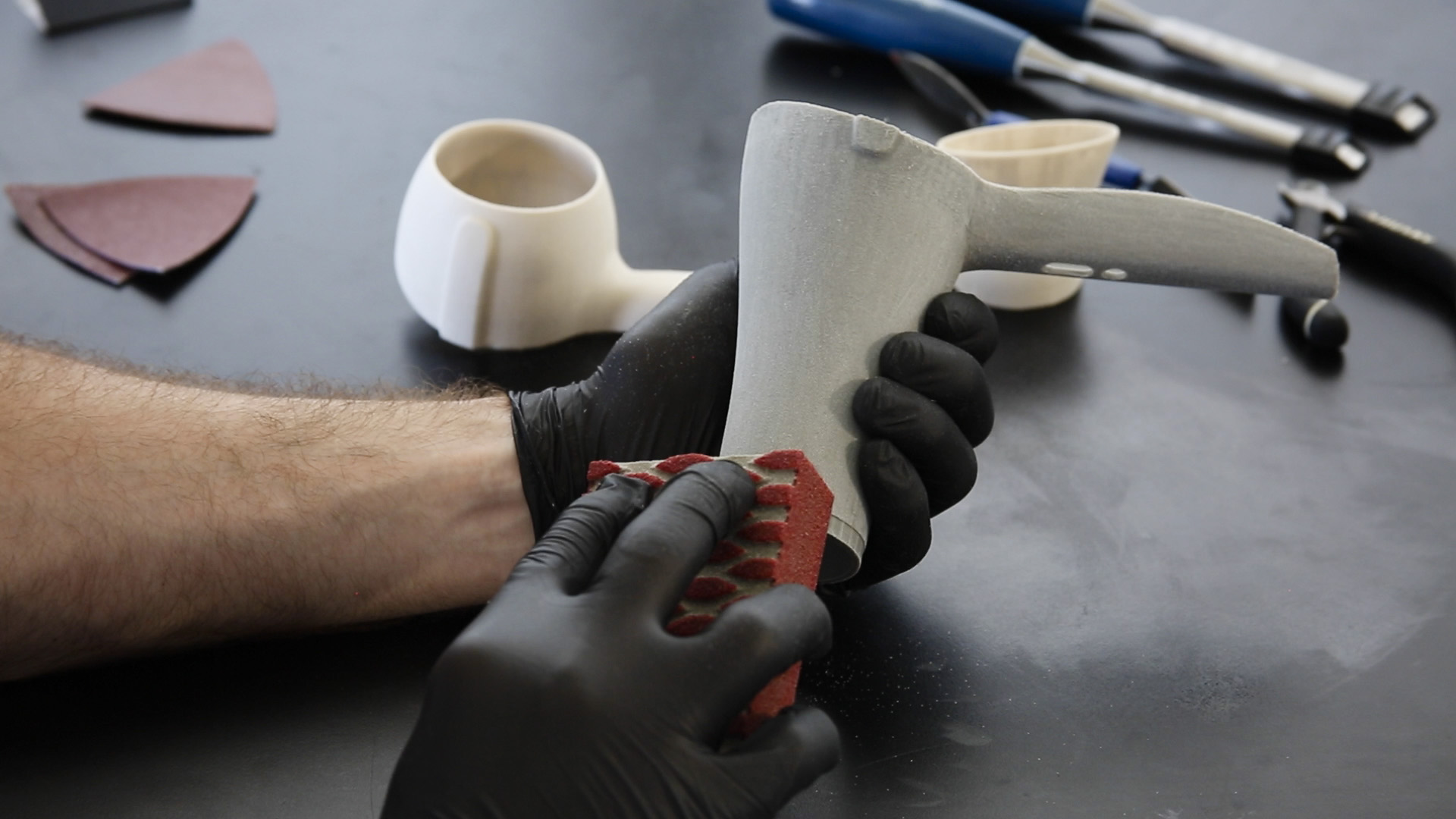 3D printing often involves a manual finish. Photo via MakerBot. 