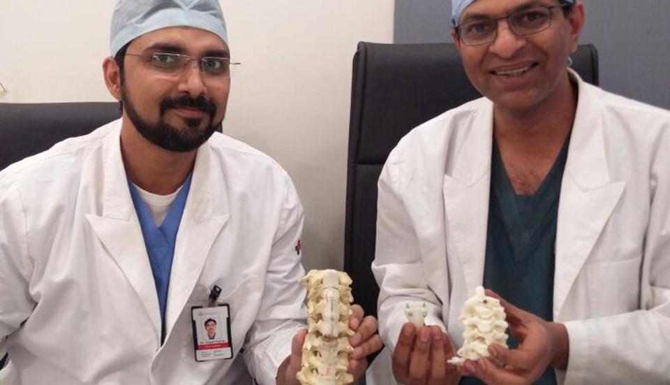 Dr Gopal Kumar and Dr V Anand Naik proudly display the vertebrae. Photo via Hindustan Times. 