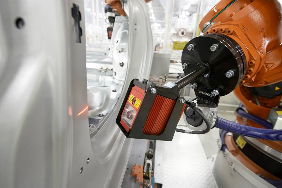 A Perceptron Helix sensor is used to examine a car door. Photo via: PerceptronMetrology on Facebook