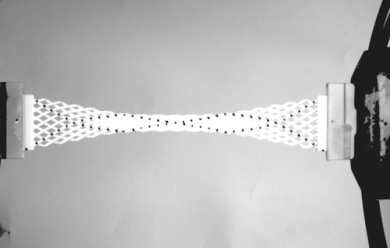 Tensile test on a non-orthogonal lattice (obtuse angled) Photo via Turco, Golaszewski, Giorgio and Placidi