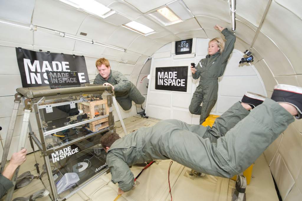 Testing the Made In Space 3D printer inside the Microgravity Science Glovebox (MSG) Engineering Unit at Marshall Space Flight Center. Photo by NASA