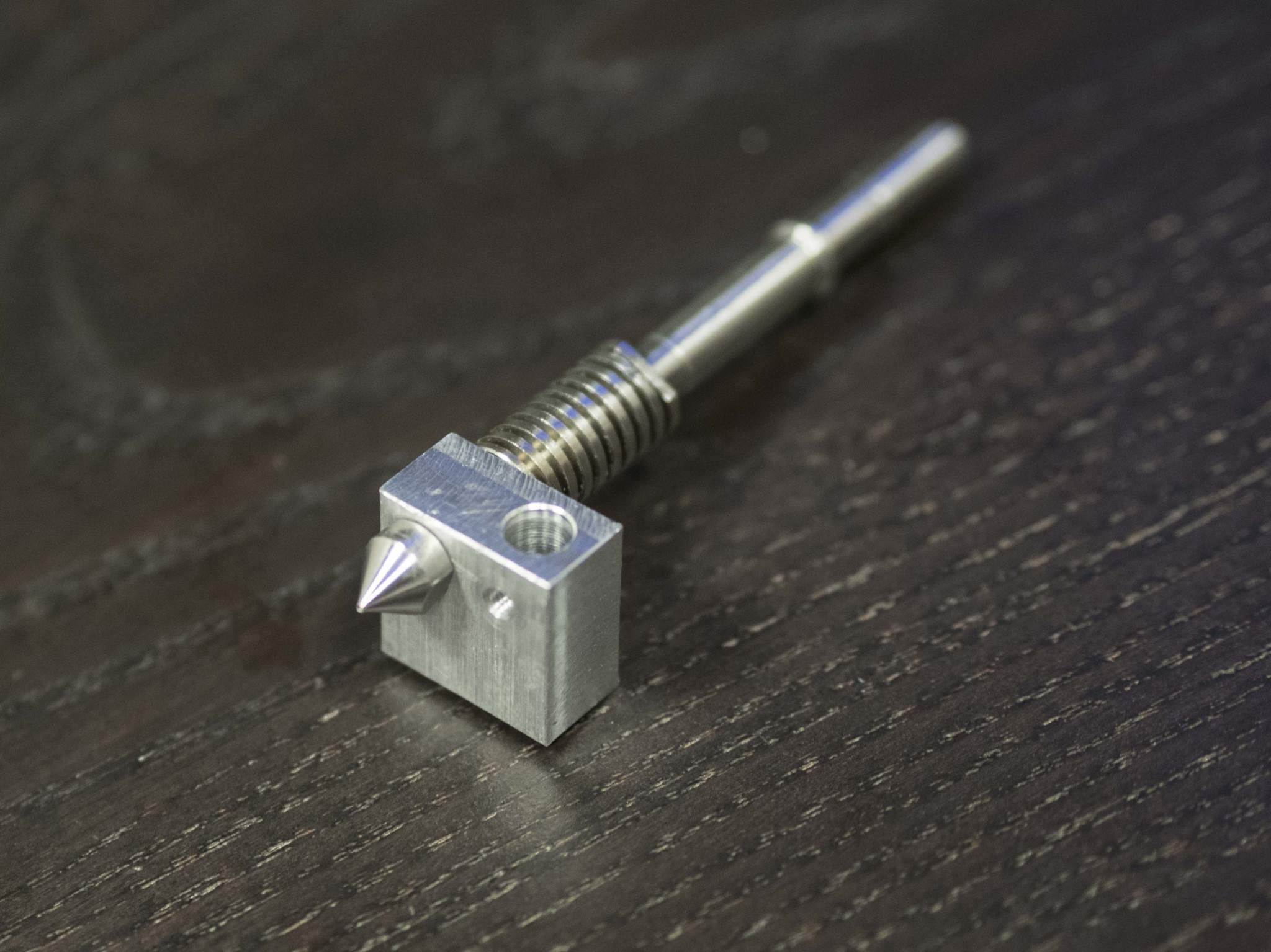 The stainless steel extruder. Photo via Roboze. 