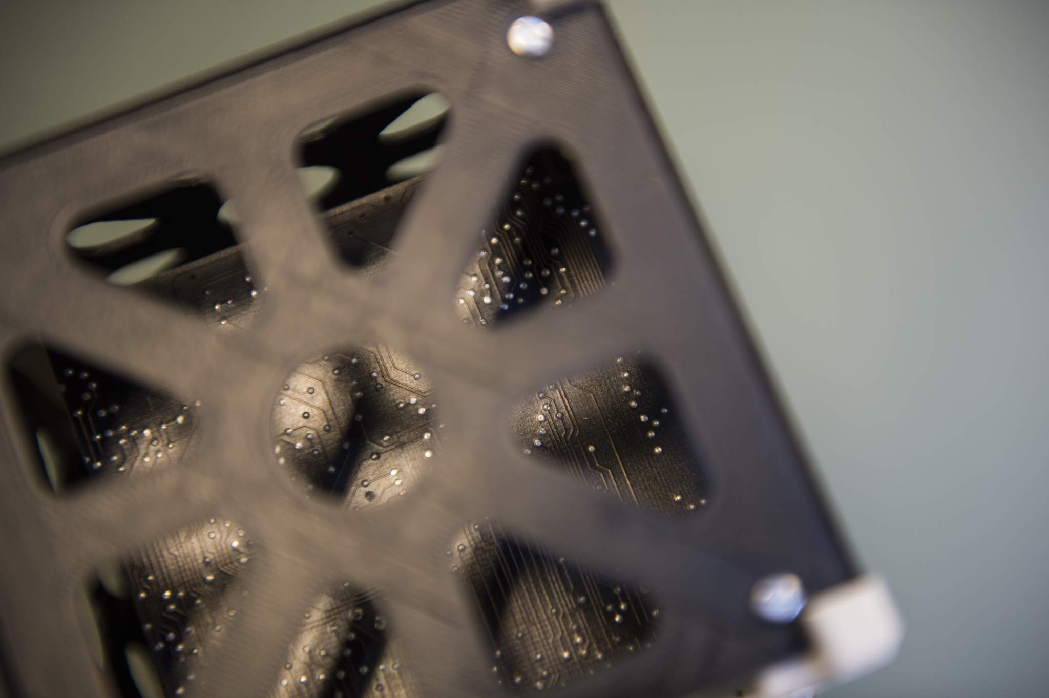 Close-up of the 3D printed cube sat structure. Photo via ESA/Medialab. 