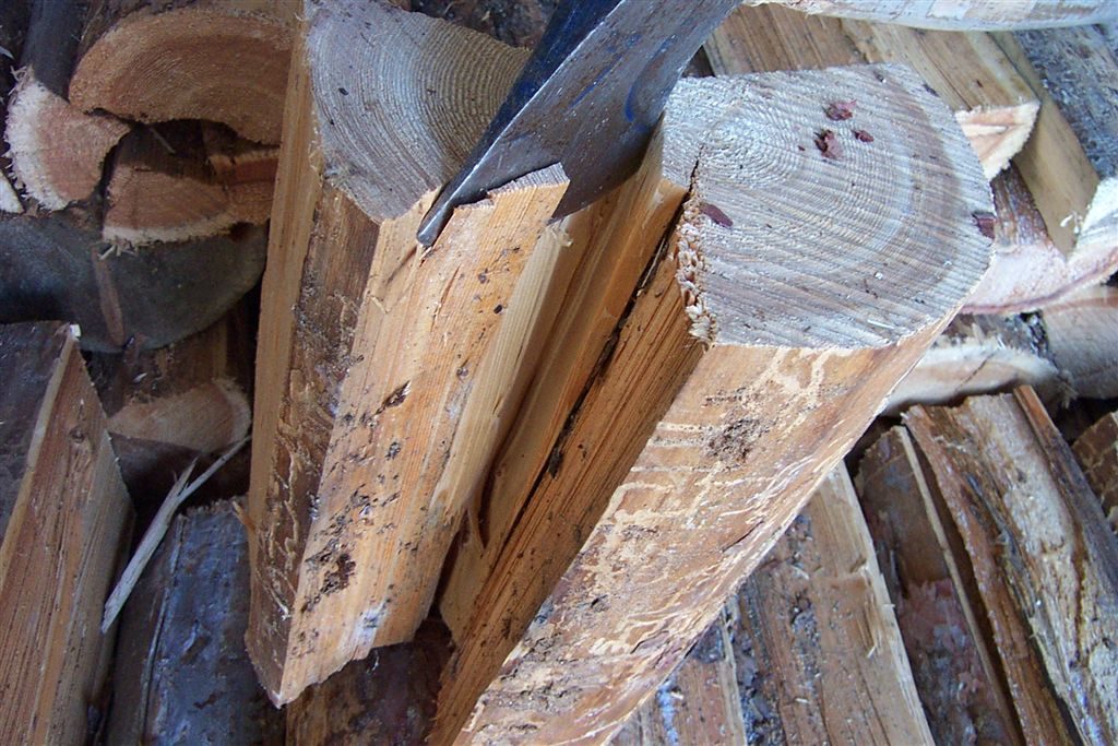 Wood splits more easily when an axe hits going with the grain. Photo by Paul Fosselman, pfos on Flickr