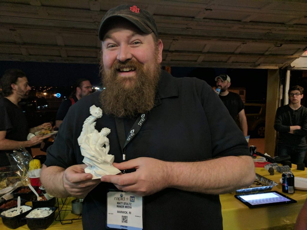 Matt Stultz of Make Magazine with the 3D Printing Industry Award. Photo by Michael Petch.