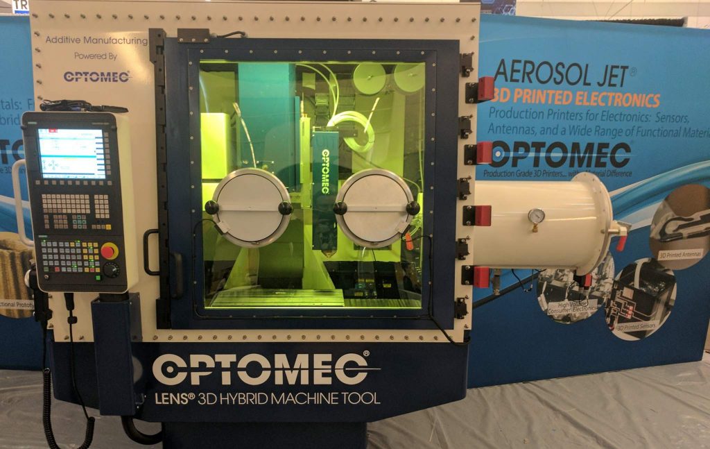 The Optomec LENS 3D Hybrid Machine Tool at RAPID + TCT. Photo by Michael Petch.