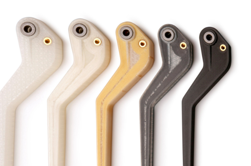 Nylon brake levers with varying faber reinforcement 3D printed using Markforged technology. Photo via 3DHubs
