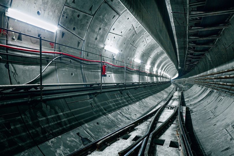 Concrete jigsaw blocks paving the underground Elizabeth line. Photo by Christoffer Rudquist