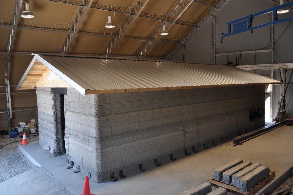 Cement barracks hut 3D printed at the Construction Engineering Research Laboratory in Champaign, Illinois. Army photo by Mike Jazdyk