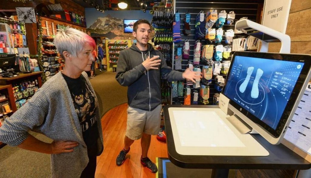 A Superfeet FitStation booth in use at Fairhaven Runners & Walkers store. Photo by Pilip A. Dwyer via Bellingham Herald