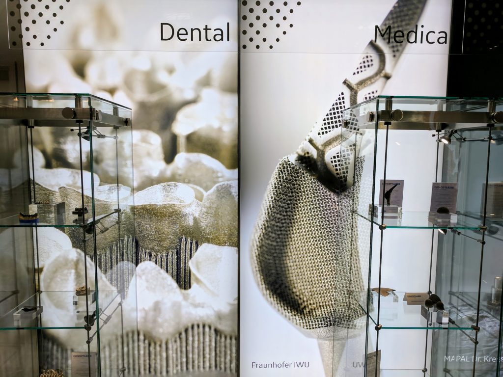 Additive dental and medical applications on display at the GE Additive booth during TCT 2017. Photo by Michael Petch.