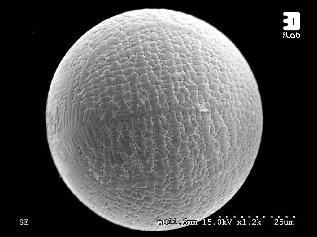 An electron microscope image of a single metal sphere, the key to all powder bed fusion based additive manufacturing. Image via 3D Lab.