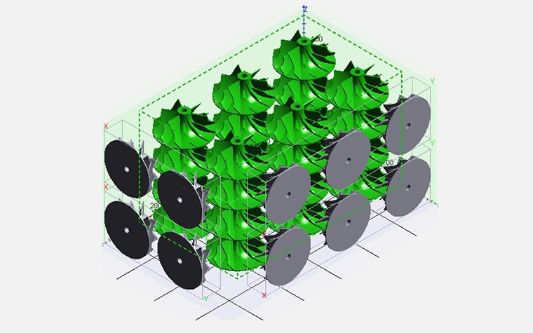 Nested turbine impellers, ready for 3D printing inside the VX220 system. Image via voxeljet