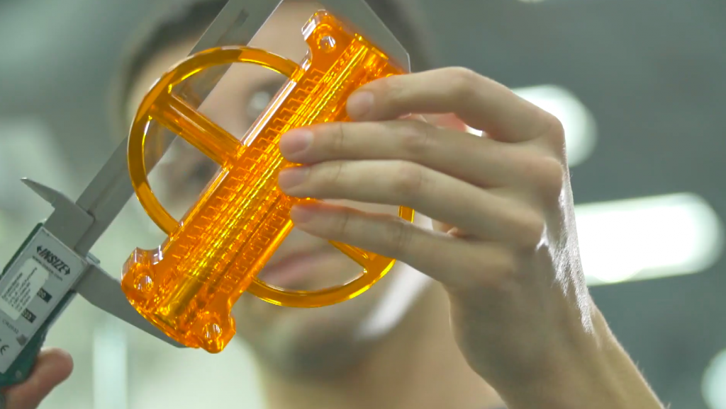 An SLA 3D printed tool. Photo via Proto Labs.