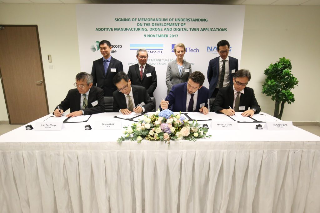 MOU signing by respective representatives of (seated from left) SIMTech, Sembcorp Marine, DNV GL, and NAMIC. Photo via A*STAR