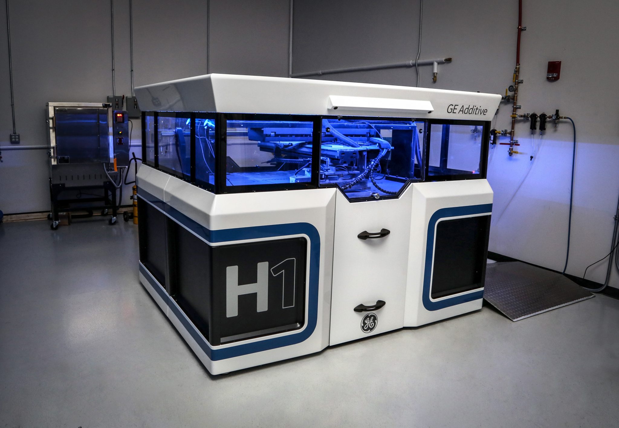 The prototype H1 binder jet 3D printer from GE Additive. Photo via GE