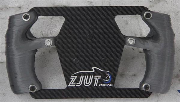The ZJUT steering wheel with custom 3D printed grips. Photo via SHINING 3D