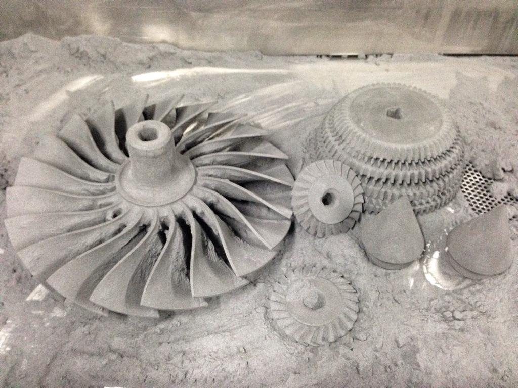 3D printed graphite parts inside the 3D printer. Photo via Graphite AM.