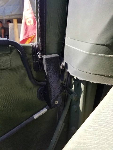 The 3D printed door handle installed inside a Humvee. Photo by Sgt. Brytani Wheeler