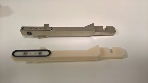 UPSA achieved a 95 percent cost reduction by replacing cast steel arms with 3D printed arms using Stratasys' ABS-M30i 3D printing material. Photo via Business Wire.
