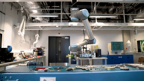 A robot arm sorts e-waste for recycling. GIF via University of South Wales YouTube.