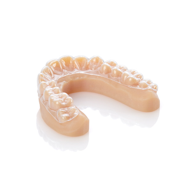 Clear dental aligner mold 3D printed with the Stratasys J700.