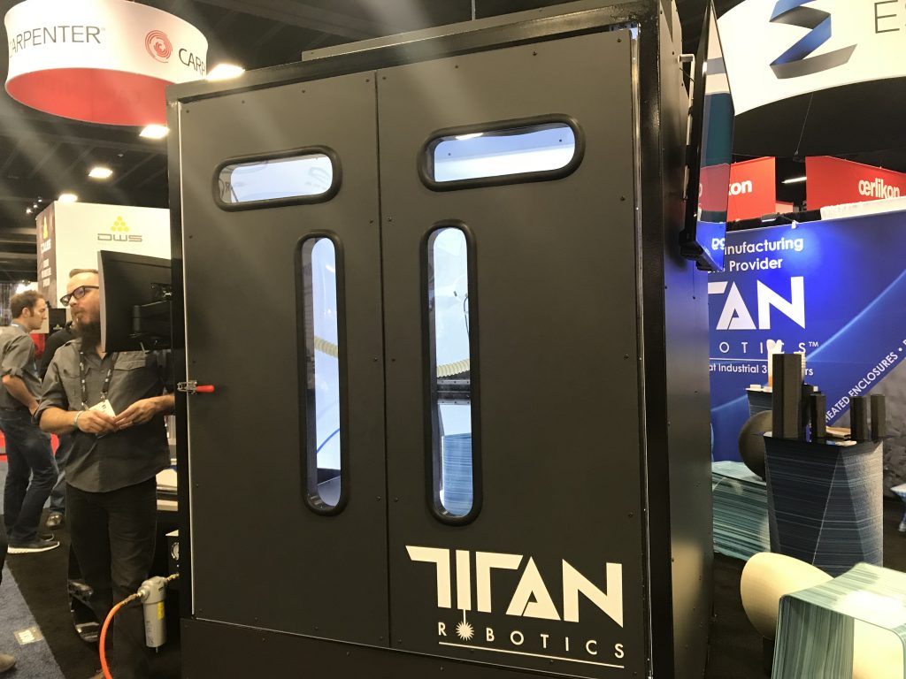The Titan Robotics Enclosed Atlas with Pellet Extrusion at RAPID + TCT 2018. Photo by Beau Jackson