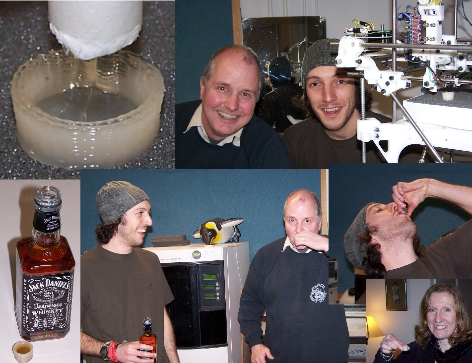 Dr. Adrian Bowyer and Ed Sells with the process to make the first Darwin 3D printed shot glass. Photo via Adrian Bowyer