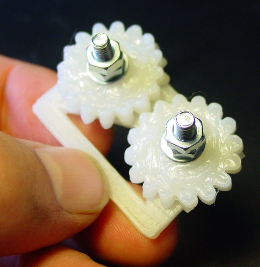 3D printed gears for the RepRap. Photo via Vik Olliver.