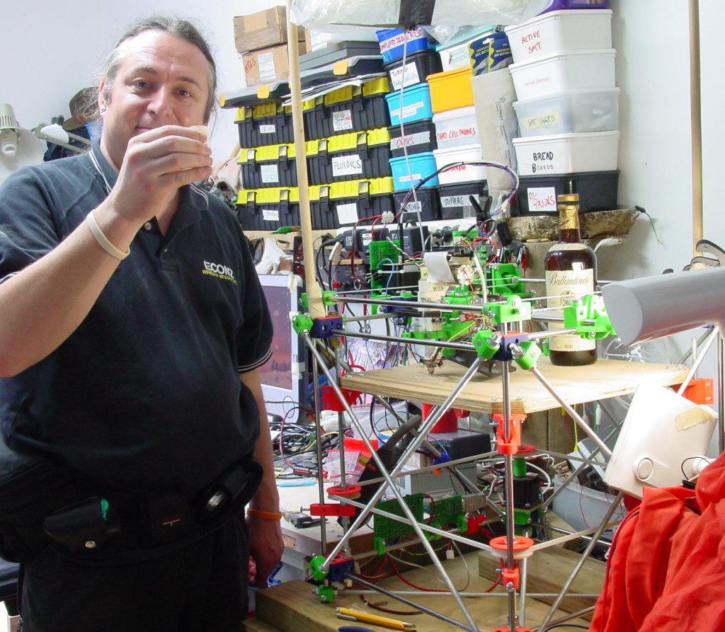 Vik Olliver and his RepRap 3D printer. Photo via Vik Olliver.