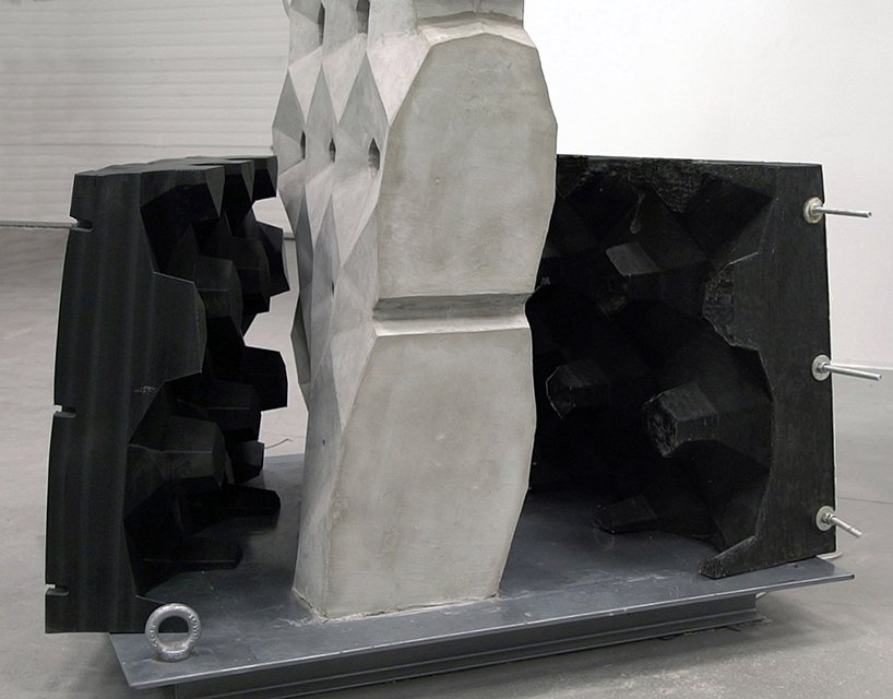 3D printed mold/formwork removal from the Smart Concrete Wall. Photo via Designboom/BigRep