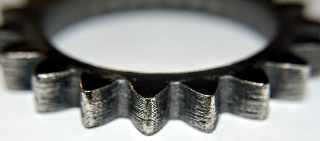 A gear 3D printed using Filamet™ material.
