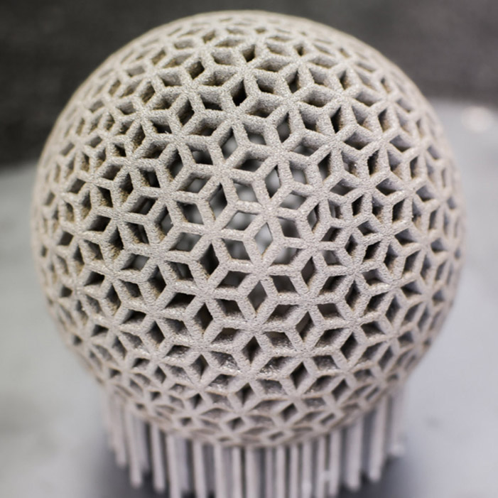 Stainless steel rhombus ball created using Rapid Manufacturing Technology. Photo via Aurora Labs.