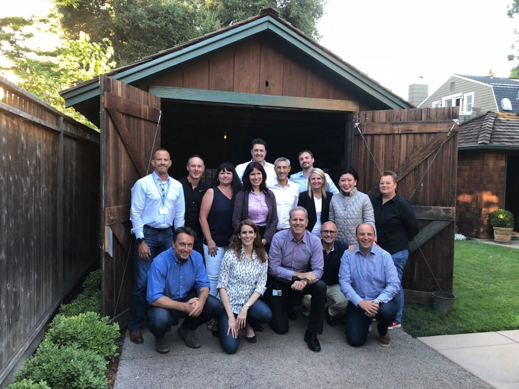 Stephen Nigro at the center (front) of HP's 3D printing team in front of the garage where the company was founded. Photo via Stephen Nigro/HP