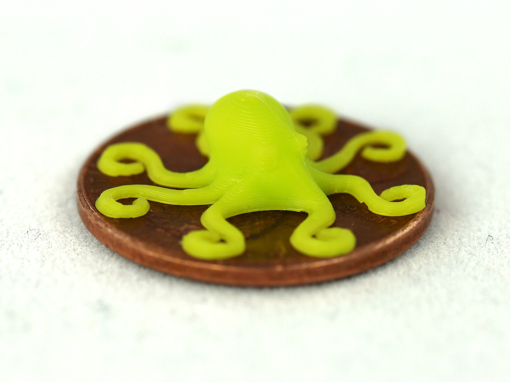 A penny-sized octopus printed using the new Aerostruder v2 Micro Tool Head. Photo via Aleph Objects.