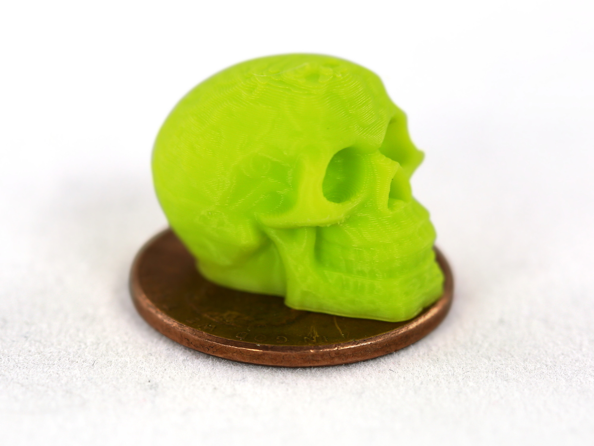 A penny-sized skull printed using the new Aerostruder v2 Micro Tool Head. Photo via Aleph Objects.