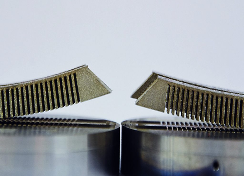 Distortion on LPBF 3D printed Inconel competent heated only from below (left) versus the same Inconel component made when heated from above and below (right). Photo via Fraunhofer ILT